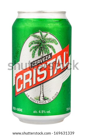 HAVANA,CUBA - DECEMBER 25, 2013:Authentic cuban beer Cristal isolated on white.With an alcohol content of just 4.9% this light beer is the favorite of locals and foreign tourists visiting Cuba