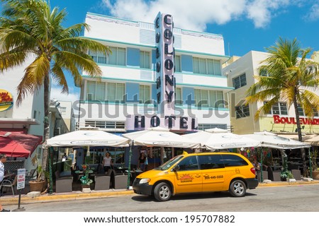 MIAMI,USA - MAY 21,2014 : The Colony Hotel at Ocean Drive in Miami Beach, Florida. This famous Art Deco building in South Beach is one of the photographed attractions in Florida