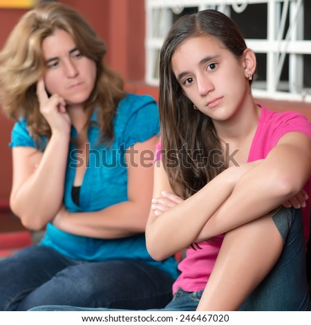 Teenager problems - Teenage girl ignoring her worried mother