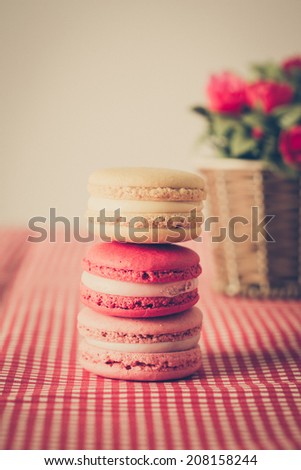 Macarons on table with vintage color tone