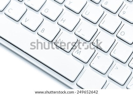 Selenium Tone Processed : close-up of white computer keyboard on a white background