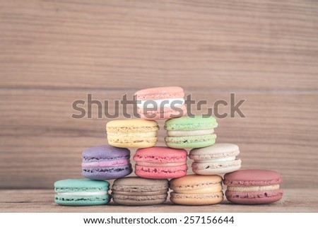 Stack Focus Image Of Colorful French Macarons On Wooden background : Pastel Filtered Process