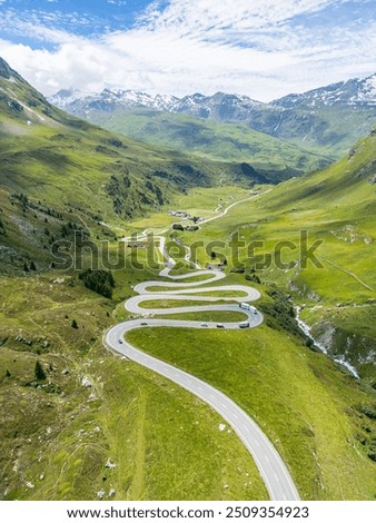 Similar – Image, Stock Photo Alpine road with hairpin bends