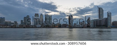 LONDON, UK -AUGUST 22, 2015: Canary Wharf is a major business district located in London, UK. It\'s a home to the headquarters of numerous major banks and other professional service firms