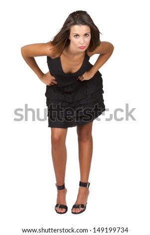 Sexy young woman kissing with a black dress isolated in white background