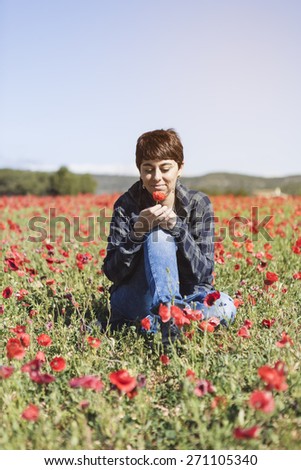 Happy beautiful woman in meadow. Freedom concept background