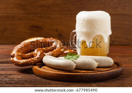 Similar – Image, Stock Photo German white sausage table top view. Bavarian veal sausage section