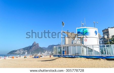 RIO DE JANEIRO, BRAZIL - AUGUST 13, 2015: Posto 9 in Ipanema Beach is a popular spot for sun bathers and athletes in the marvellous city of Rio de Janeiro.