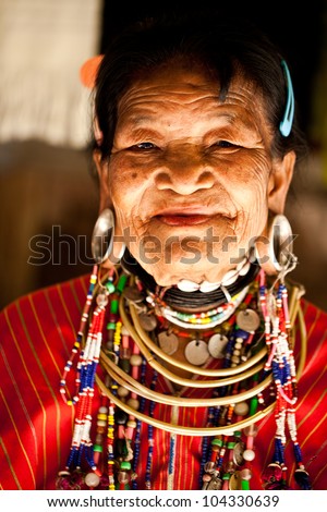NAI SOI, THAILAND - FEB 3: Unidentified Karen big ear old woman in the village, review of daily life of local people, Padaung tribe near to Myanmar border on Feb 3, 2012 in Nai Soi, Thailand.