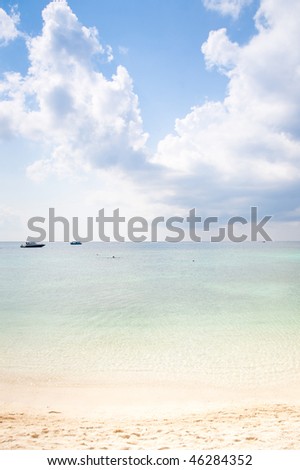 Summer beach background with clean sand  and blue sky