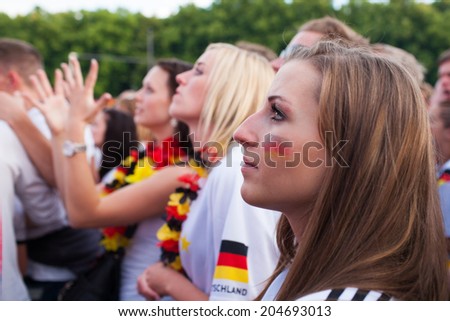 BERLIN - JUNE, 22: Unknown german fans celebrating football game on Euro 2012 near Brandenburger Tor. June 22, 2012 in Berlin, Germany