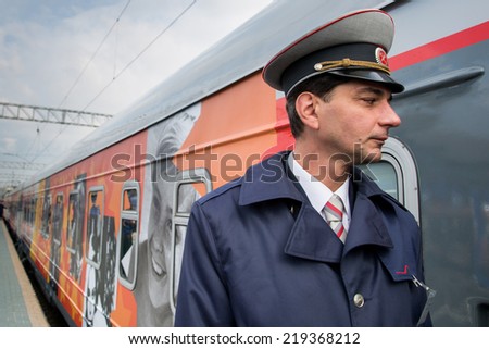 MOSCOW, RUSSIA, SEPTEMBER, 23: Trainman.Train VGIK -95 (Gerasimov Institute of Cinematography) Tour. September, 23, 2014 at Yaroslavsky railway station in Moscow, Russia