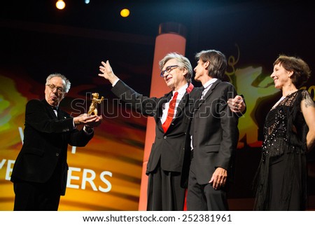 BERLIN, GERMANY - FEBRUARY 12:  D. Kosslick, M. Becker, W. Salles presents the Honorary Golden Bear Wim Wenders. 65th Berlinale at Berlinale Palace on February 12, 2015 in Berlin, Germany.