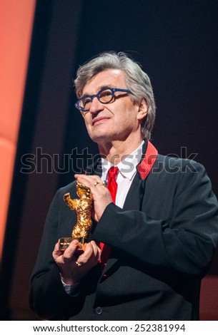 BERLIN, GERMANY - FEBRUARY 12: Wim Wenders receives the Honorary Golden Bear for his lifetime achievement. 65th Berlin  Film Festival at Berlinale Palace on February 12, 2015 in Berlin, Germany