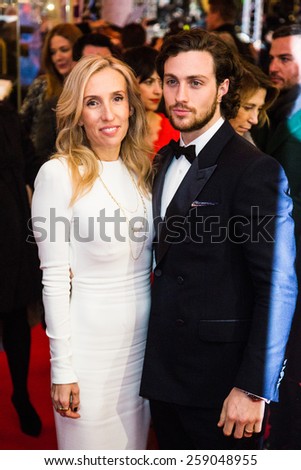BERLIN, GERMANY - FEBRUARY 11: Sam Taylor-Johnson with husband Aaron, \'Fifty Shades of Grey\' premiere. 65th Berlinale International Film Festival at Zoo Palast on February 11, 2015 in Berlin, Germany.