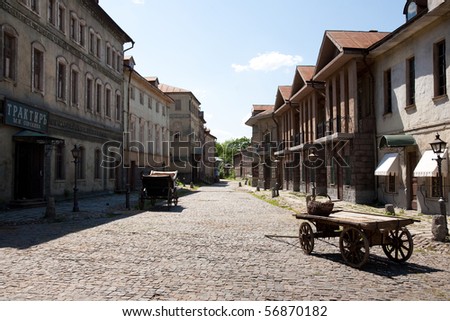 Similar – Foto Bild Fassade. Filmkulisse eines Doppelhauses neben einer Straßenlaterne