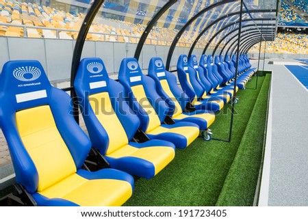 KIEV (KYIV), UKRAINE - October 04, 2012: Empty coaching chairs before a football match.