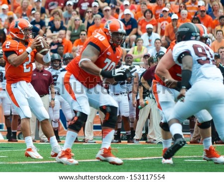 CHAMPAIGN,IL-AUGUST 31: Illinois quarter back Nathan Sheelhaase (2) drops back to pass to Matt LaCosse (11) for a gain of 5 yards on Saturday, Aug 31, 2013.