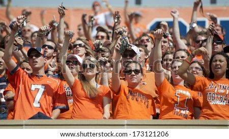 CHAMPAIGN,IL-SEPTEMBER 28: Illini students jingle keys in order to distract the Miami-OH team during a game on Saturday, Sept 28, 2013.
