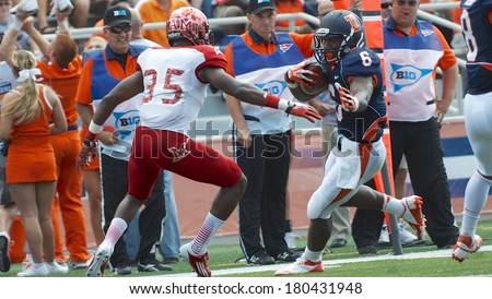 CHAMPAIGN,IL-SEPTEMBER 28: University of Illinois running back Josh Ferguson (6) attempts to out run a Miami-OH defender and score a touch down during a game on Saturday, Sept 28, 2013.