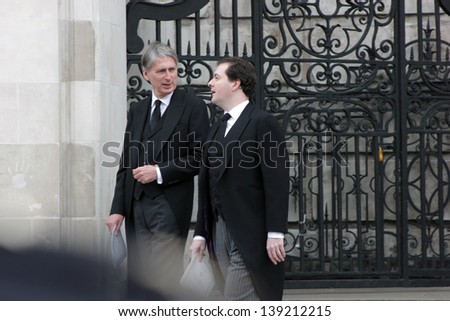 LONDON - APRIL 17: George Osborne and Philip Hammond leave the funeral service for Margaret Thatcher at St. Paul\'s Cathedral on April 17, 2013 in London.