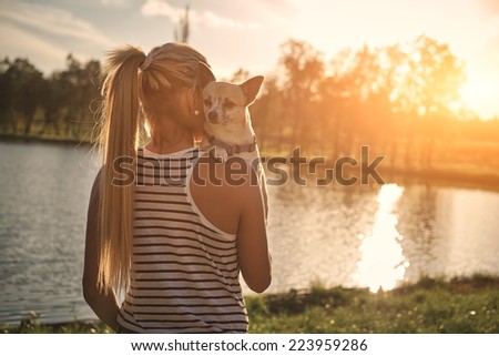 Blonde girl and chihuahua