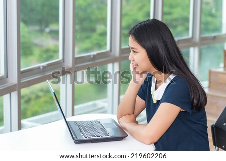 Asia woman working on computer