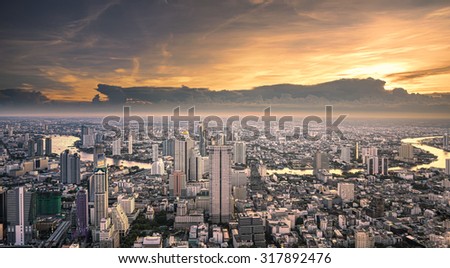 Landscape of River in Bangkok city in night time with bird view