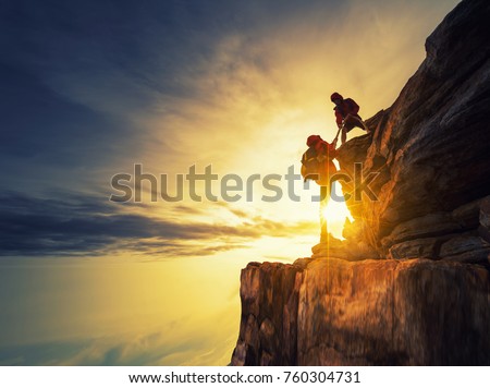 Asia couple hiking help each other silhouette in mountains with sunlight. ストックフォト © 