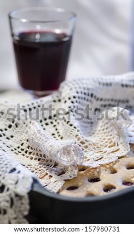 Homemade cherry pie with a knitted cloth. From the series \