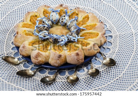 Homemade yeast cake with carrot filling in the shape of sunflower.  From series Food for Easter table