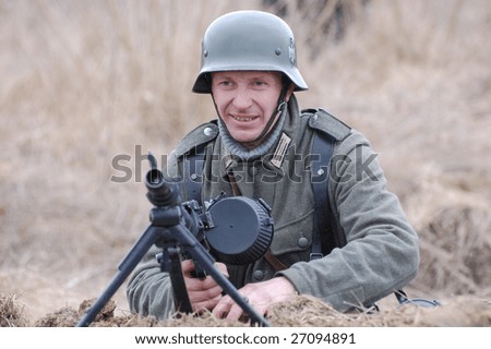 VINNITSA, UKRAINE - MAR 21: A member of history club called Red Star wears historical German uniform as he participates in a WWII reenactment in Vinnitsa, Ukraine on March 21, 2009.