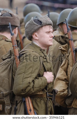 Man Wears Historical Soviet Uniform As He Participates In A Wwii ...