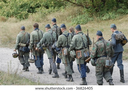 KIEV, UKRAINE - SEPT 6, : Members of a history club wear historical German uniforms as they participates in a WWII reenactment.Defense Kiev from German troops in 1941. September 6 , 2009 in Kiev, Ukraine