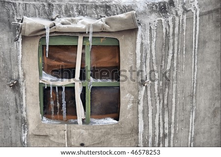 Frozen window.Soviet military tent in snow.Historical reenacting of WW2. Kiev,Ukraine