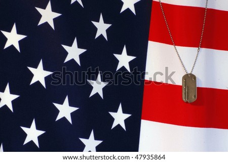 Dog tag on American flag