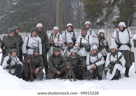 KIEV, UKRAINE - FEB 14: Members of a history club wear historical German uniforms during a WWII reenactment of 'Defense Kiev in 1943' on February 14, 2010 in Kiev, Ukraine