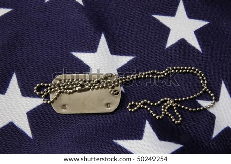 Dog tag on American Flag