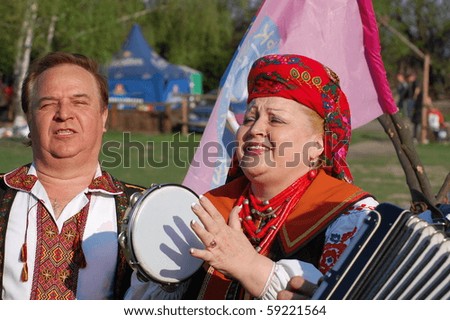 KIEV, UKRAINE - MAY 2: Ukraine annual folk culture festival. Folk singers wear historical Ukrainian costume May 2, 2010 in Kiev, Ukraine