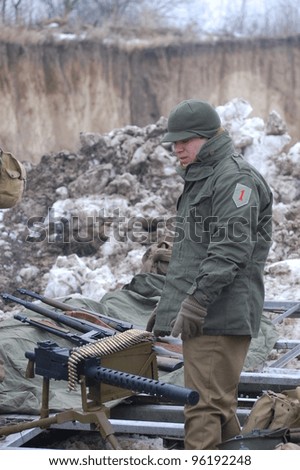 KIEV, UKRAINE -FEB 25: Unidentified member of Red Star history club wears historical American uniforms  during historical reenactment of WWII,Military history club Red Star on February 25, 2012 in Kiev, Ukraine