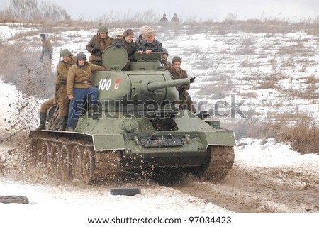 KIEV, UKRAINE -FEB 25: Old Russian tank T-34 during historical reenactment of WWII,Military history club Red Star. February 25, 2012 in Kiev, Ukraine