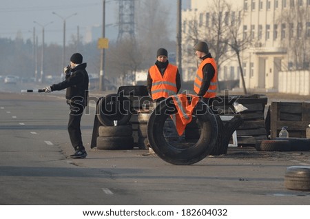 KIEV, UKRAINE - FEB 24, 2014: Traffic regulation point,created people Self defense of Kiev.Troeshina district . Riot in Kiev and Western Ukraine