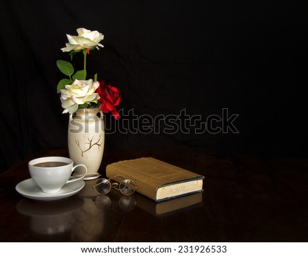 Good book, coffee and a Bouquet of Roses