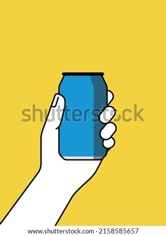 Hand holding a tin drink