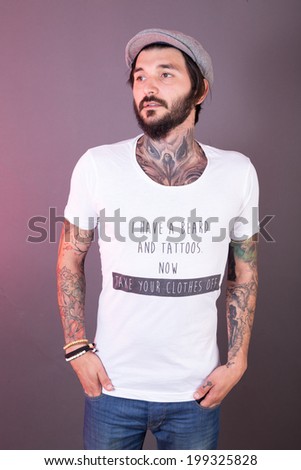tattoo man with funny t-shirt