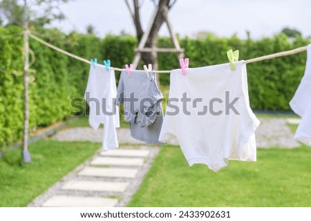 Similar – Image, Stock Photo hanging out the clothes outdoors