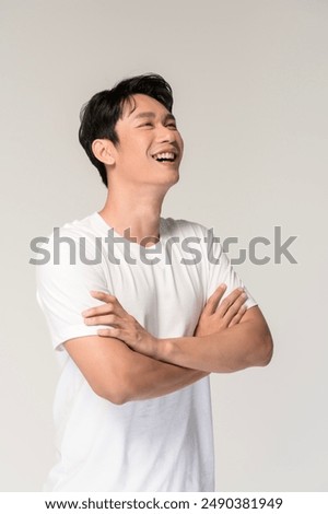 Similar – Image, Stock Photo Asian man standing on street