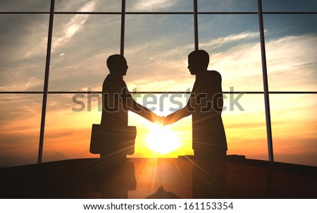 Two business  shake hand in office silhouettes rendered with computer graphic 3d