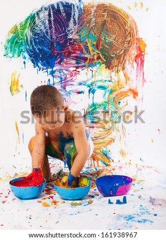 adorable kid paint stained representing the creativity and the freedom