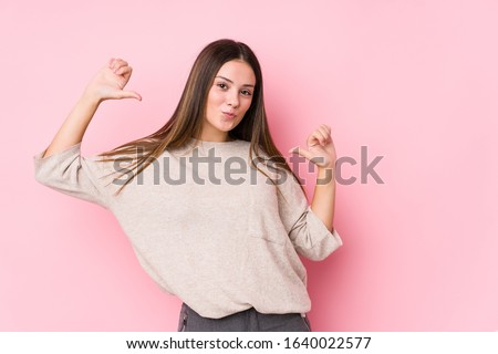 Young caucasian woman posing isolated feels proud and self confident, example to follow. ストックフォト © 